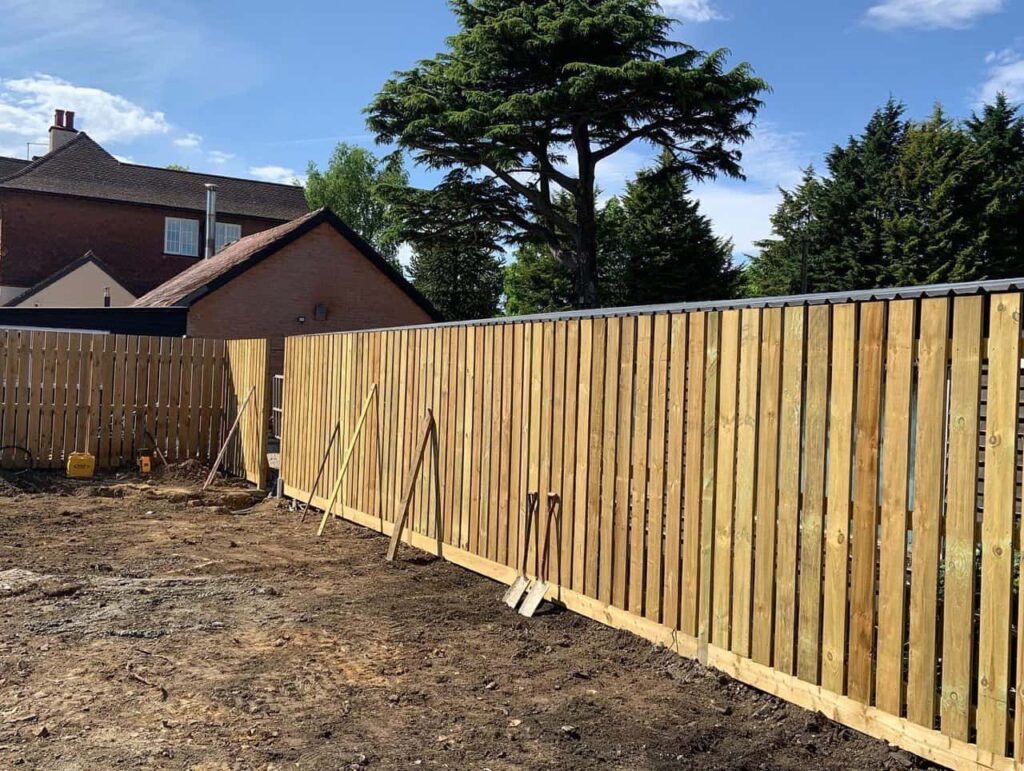 This is a photo of Bespoke custom fencing installed by Fast Fix Fencing Godstone