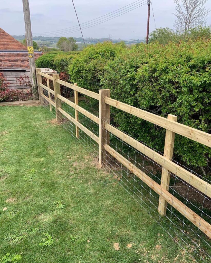 This is a photo of a picket fence and picket gate installed by Fast Fix Fencing Godstone